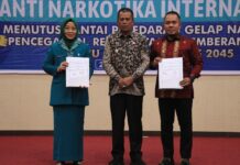 Penandatanganan kerja sama pemberantasan narkoba antara TP-PKK Payakumbuh dan BNNK dalam peringatan HANI 2025