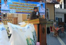 Bantuan Pangan 2025 Dimulai! 7.105 Warga Payakumbuh Terima Cadangan Beras Pemerintah Plt. Asisten II Setdako Payakumbuh, Wal Asri, memberikan sambutan saat launching penyaluran cadangan beras pemerintah untuk bantuan pangan tahun 2025 di Kelurahan Koto Baru Payobasung, Selasa (22/07/2025).