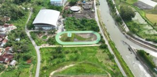 Foto udara Kawasan Batang Agam di Kota Payakumbuh yang sedang dikembangkan menjadi Riverfront City, terlihat lintasan hijau, lapangan olahraga, dan aliran sungai yang tertata.