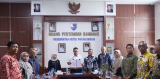 Wali Kota Payakumbuh menandatangani Perjanjian Kerja Sama Optimalisasi Pemanfaatan Data dan Informasi Perpajakan di Ruang Randang Balai Kota Payakumbuh bersama jajaran pemerintah daerah.